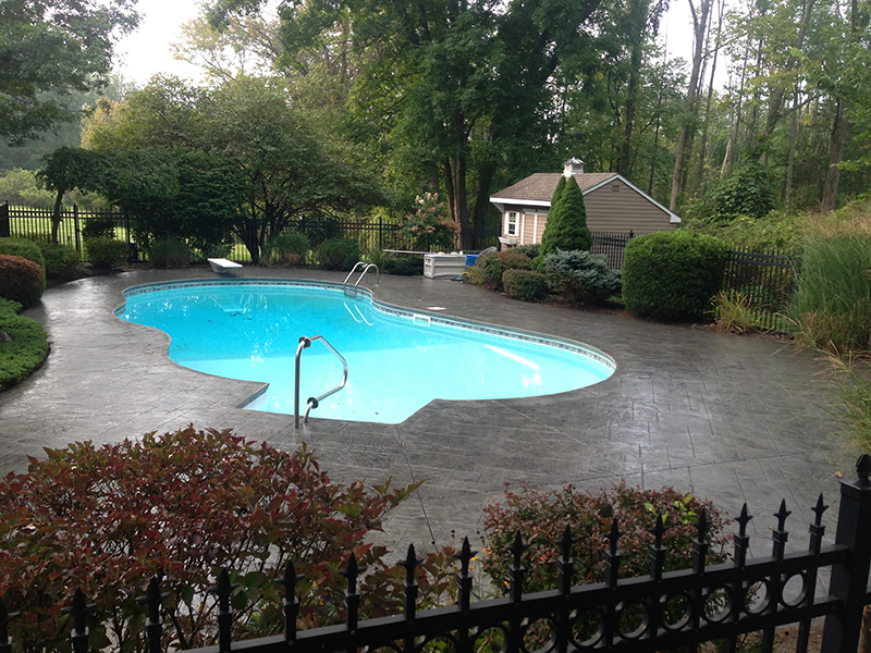 Swimming pool and stamped concrete project example 221